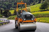 New Tandem Roller driving on Road